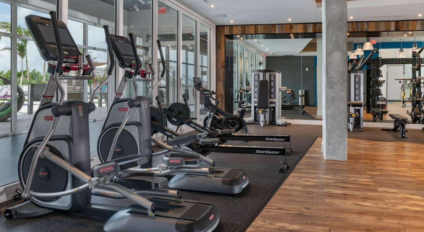 Cutting-edge amenities at your fingertips a gym with exercise equipment