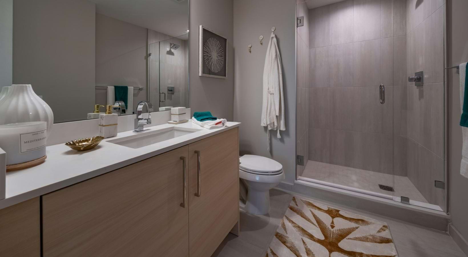 Spacious bathrooms with everything you need a bathroom with a shower and sink