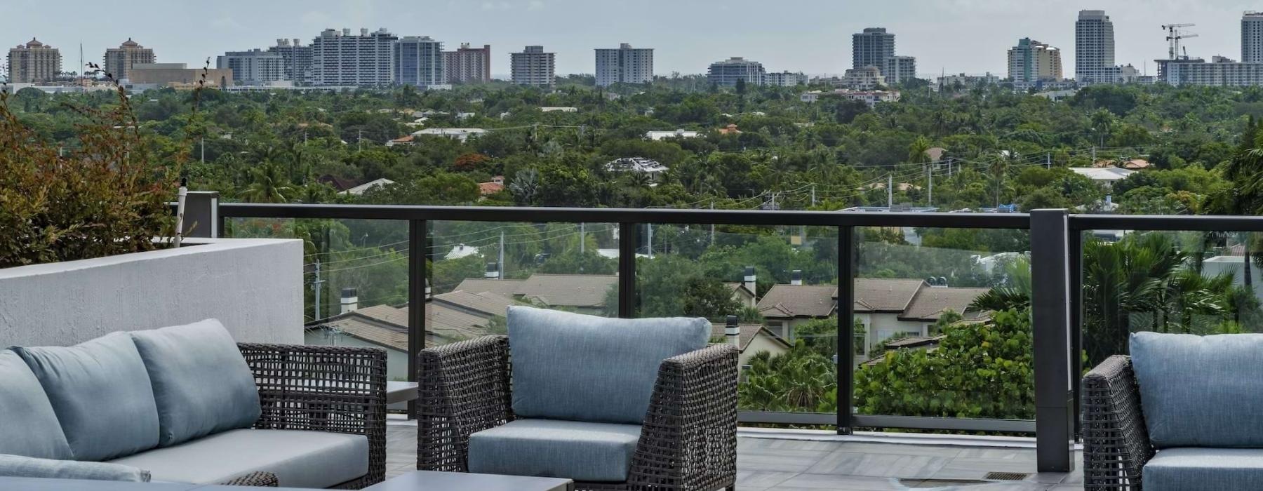 a balcony overlooking a city